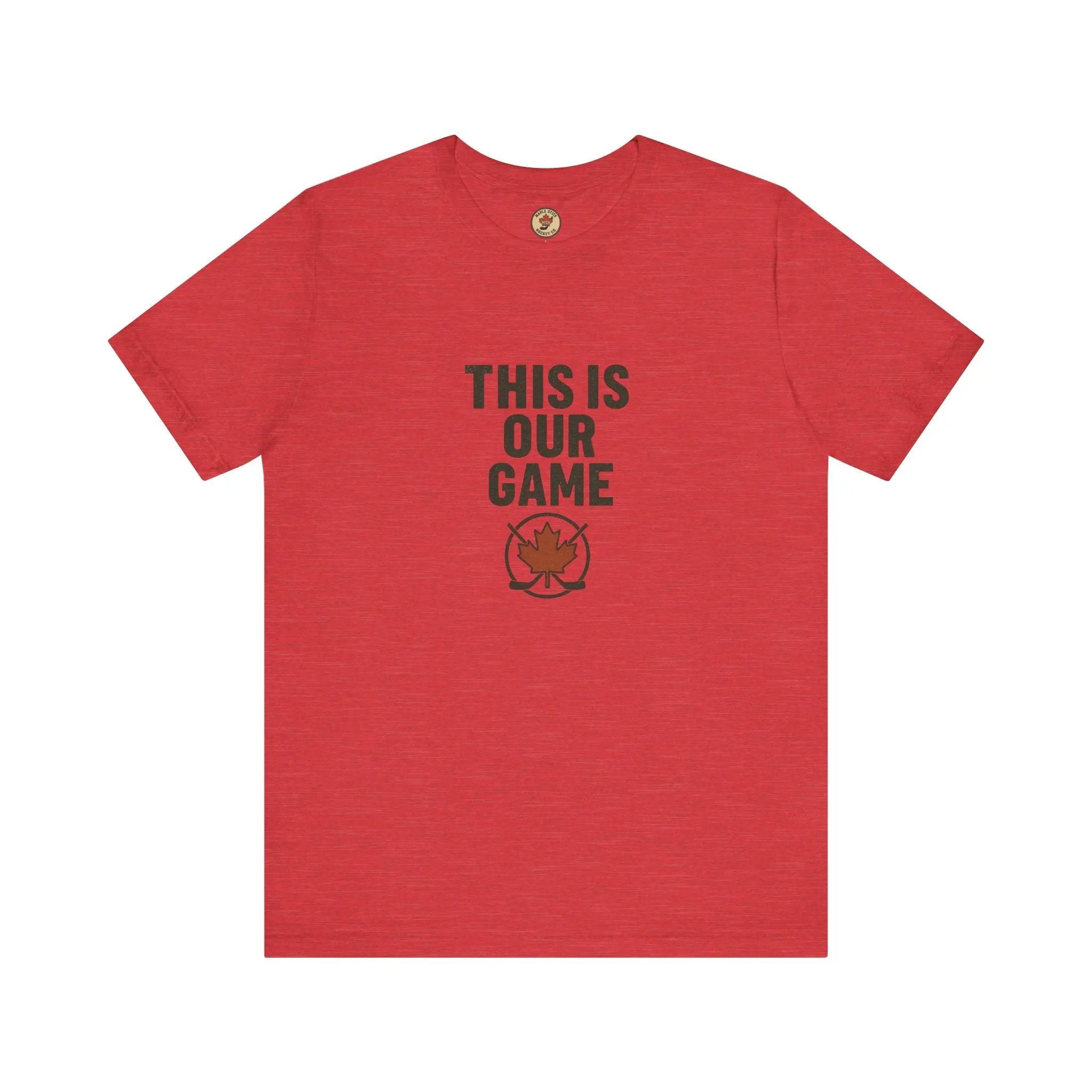 Heather red women’s T-shirt with ‘This Is Our Game’ text and maple leaf graphic – Maple Stick Hockey product.