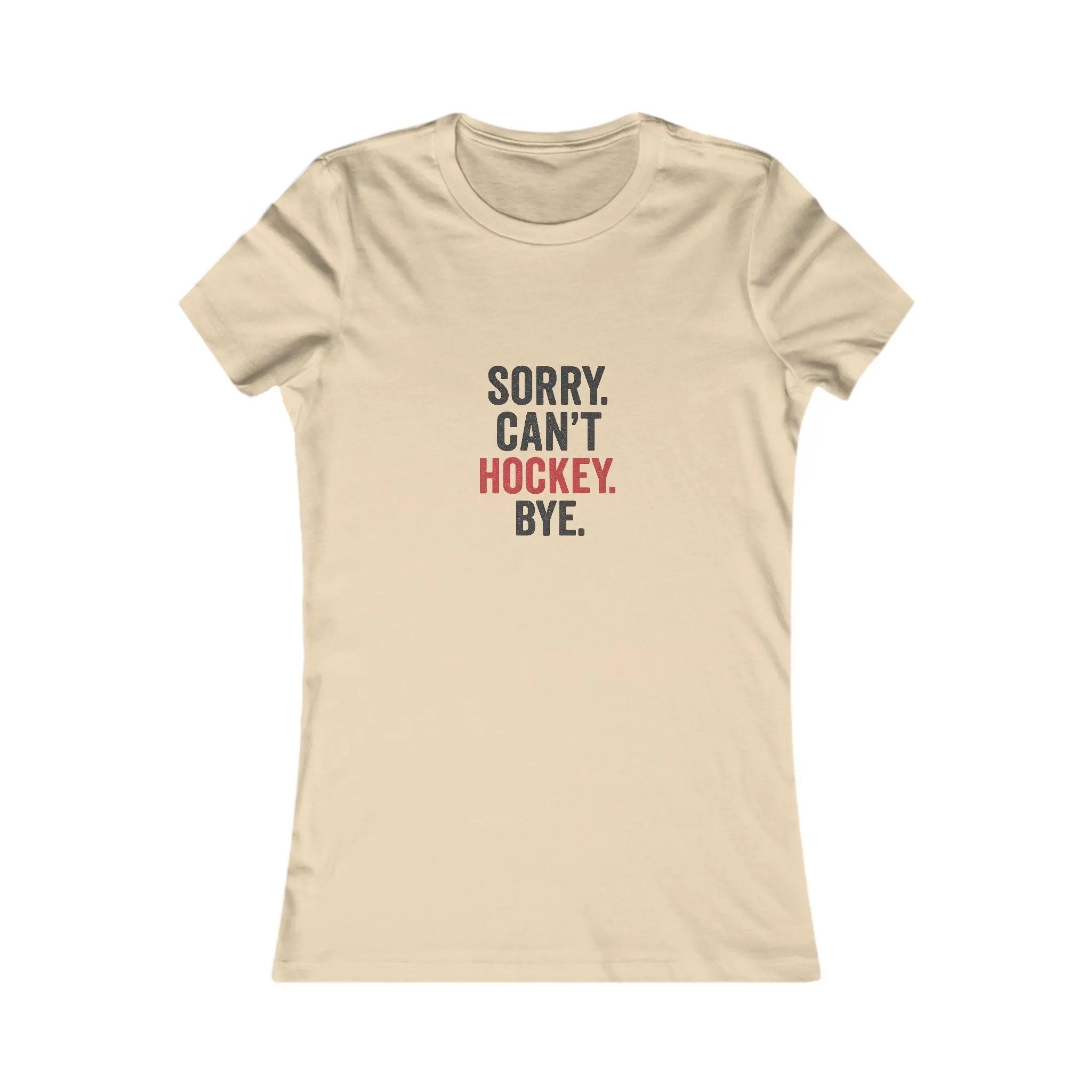 Beige T-shirt with 'Sorry. Can't. Hockey. Bye.' text graphic in black and red on front on white background