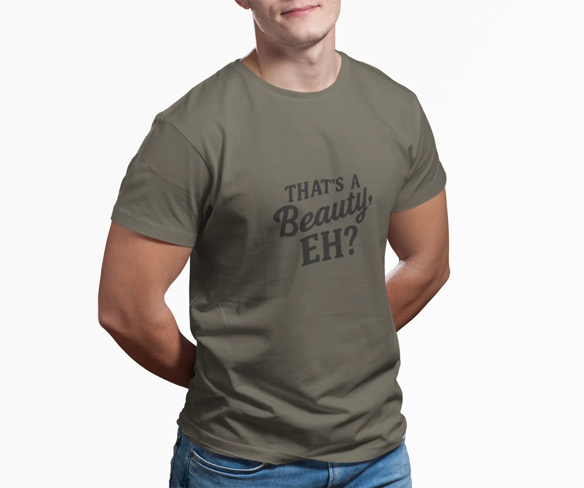 Person wearing olive green "That's a Beauty, Eh?" T-shirt with black text graphic on front against white background