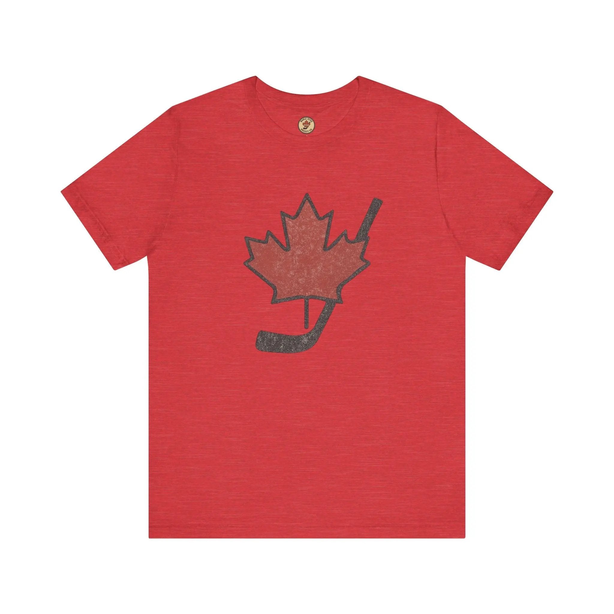 Red T-shirt with maple leaf and hockey stick graphic on front on white background