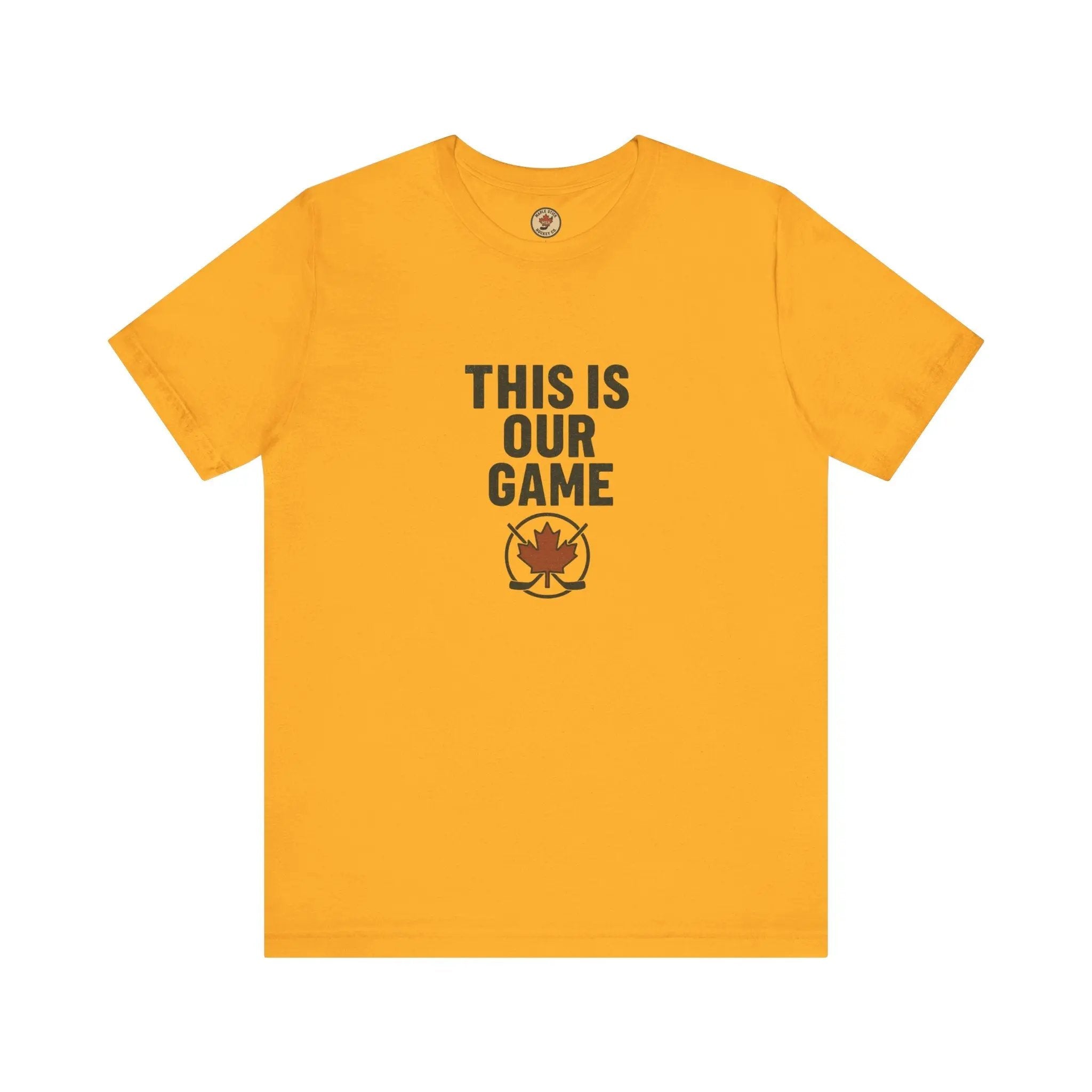 Yellow women’s T-shirt with ‘This Is Our Game’ text and maple leaf graphic – Maple Stick Hockey product.