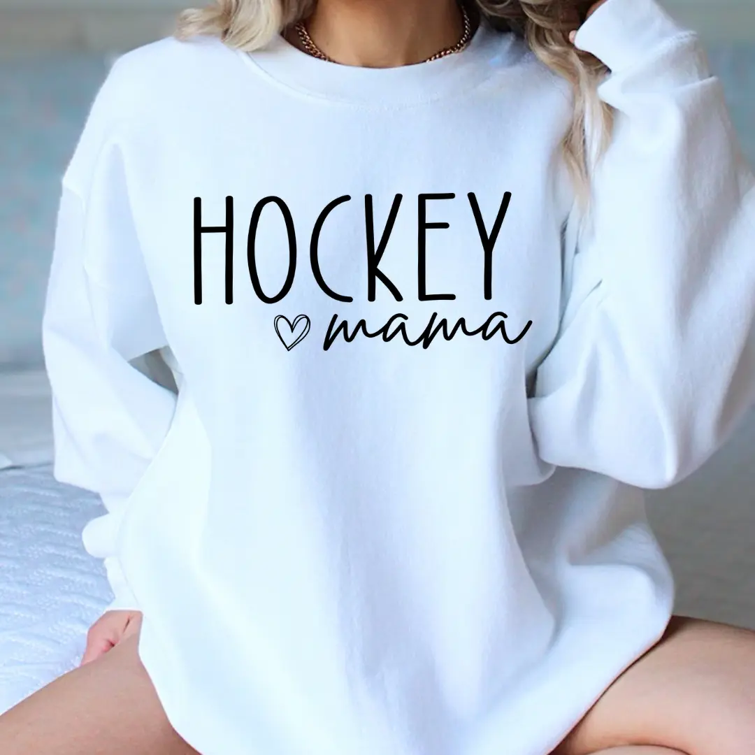 Woman wearing white 'Hockey mama' crewneck sweatshirt with black lettering – Maple Stick Hockey product