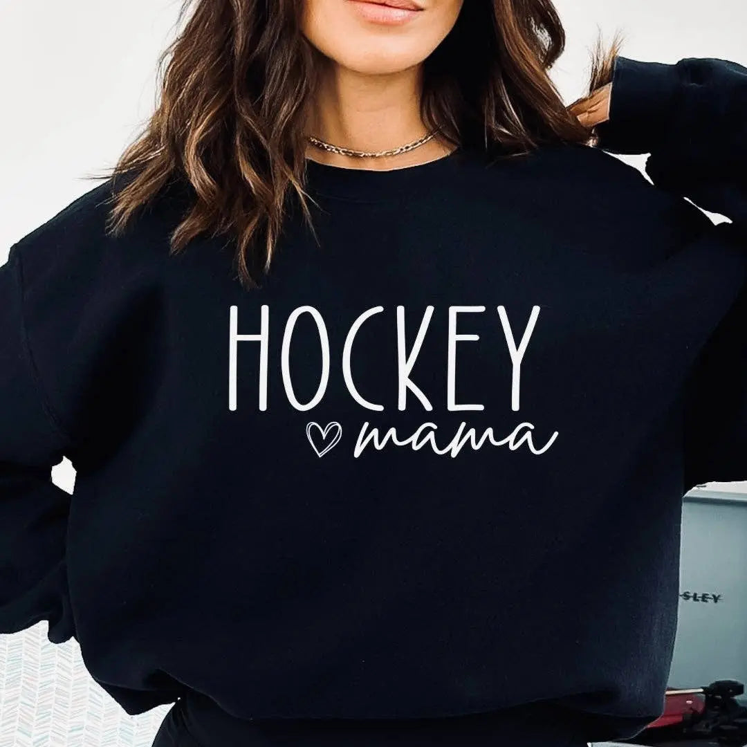 Woman wearing black 'Hockey mama' crewneck sweatshirt with white script design – Maple Stick Hockey product