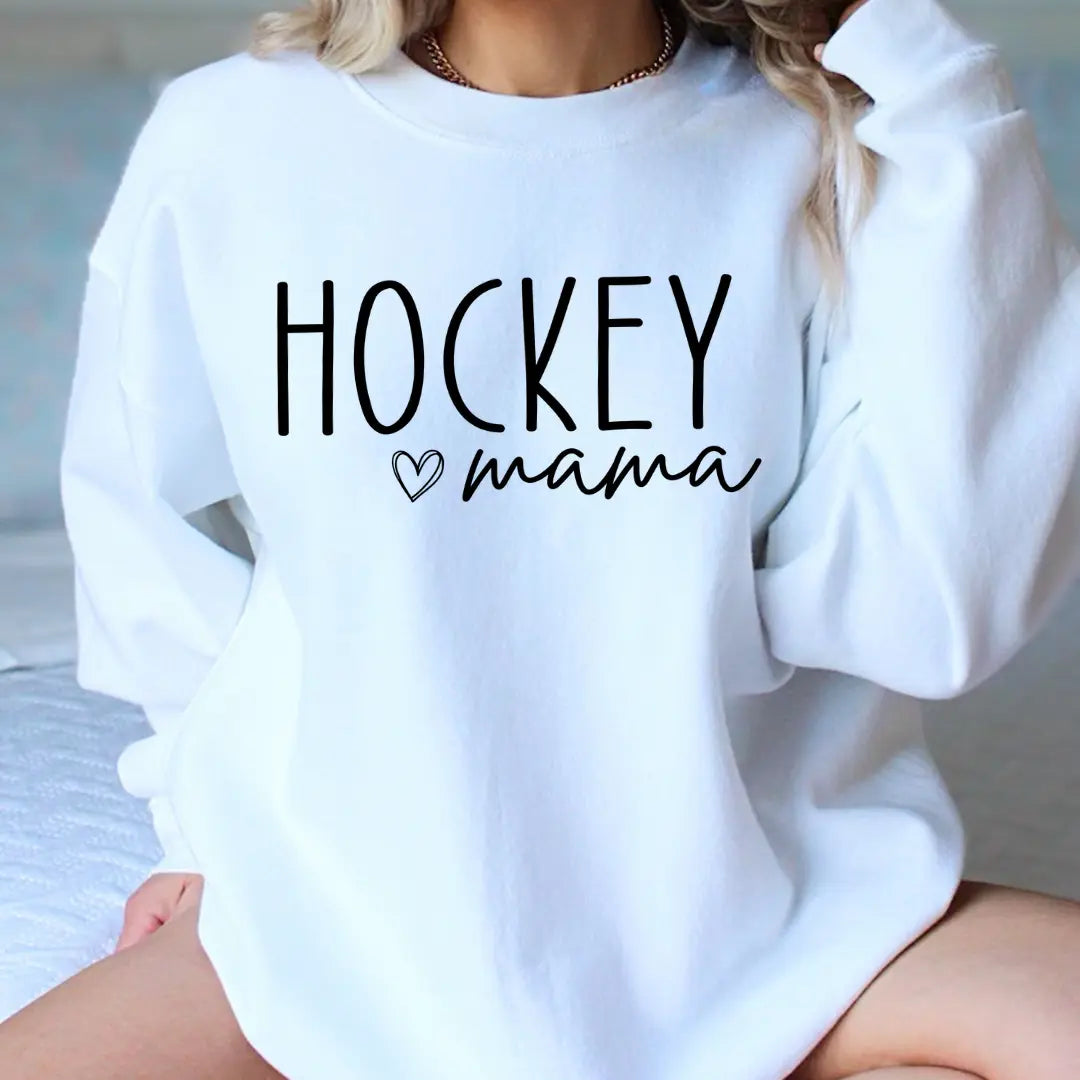 Woman wearing white 'Hockey mama' crewneck sweatshirt with black lettering – Maple Stick Hockey product